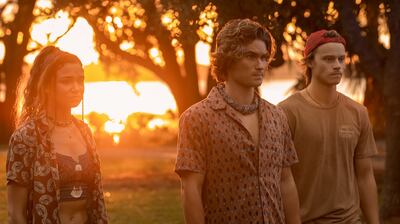 [The main characters of Netflix's 
'Outer Banks' smize into the sunset.]