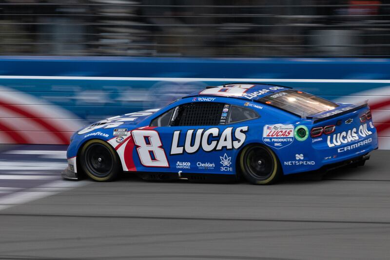 Kyle Busch’s car crosses the start/finish line near the end of the race. He won the Pala Casino 400 race after maintaining the lead for the final 20 laps after a strong race and an effective final pit stop.