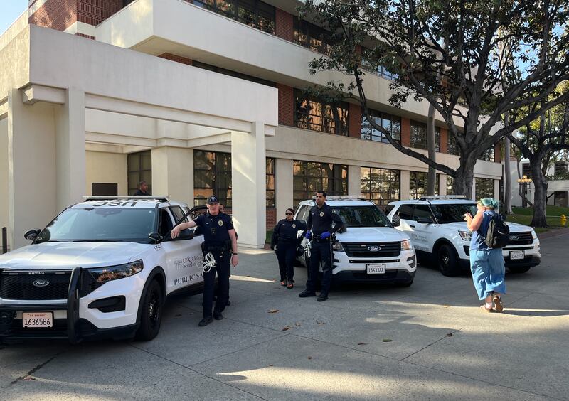 DPS cars parked outside.
