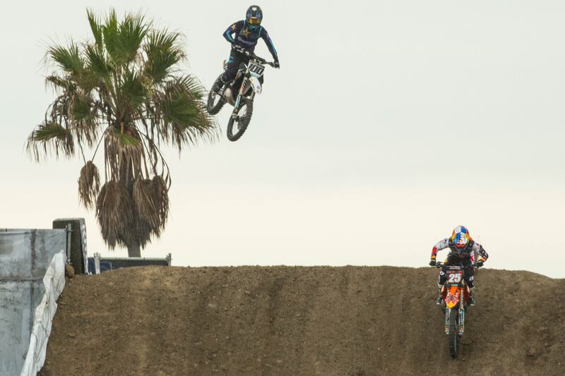 Marvin Musquin (right) finishes his race in the 250cc semifinals. Musquin went on to win the 250cc category, with Ken Roczen taking second and Justin Barcia taking third.