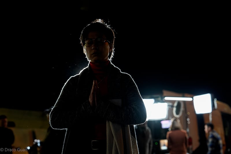 A photo of a woman praying