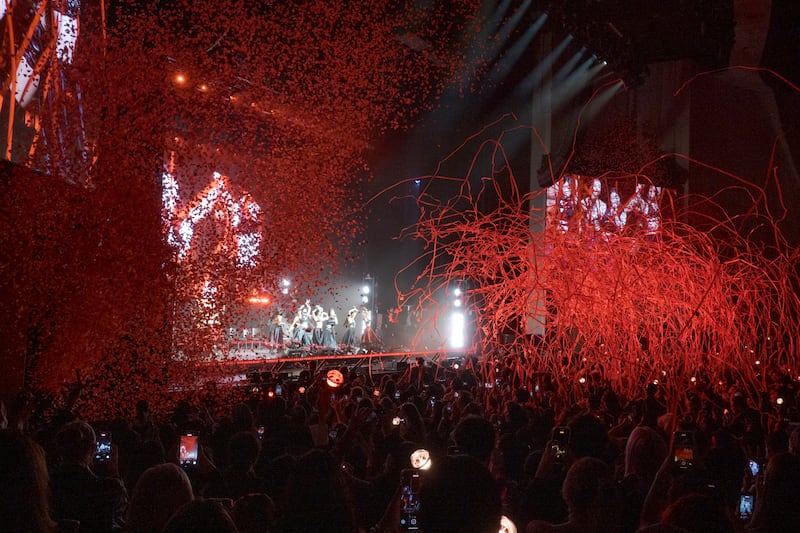 Confetti and streamers released over a crowd
