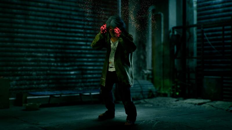 Game screenshot of a man with long gray hair and a beard in tattered rags with red hands and glowing red eyes
