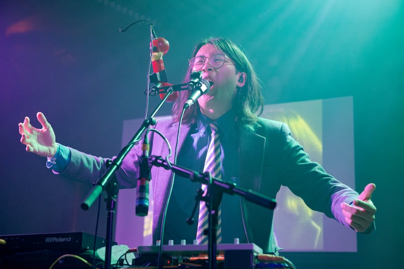 Artist shouting in a microphone