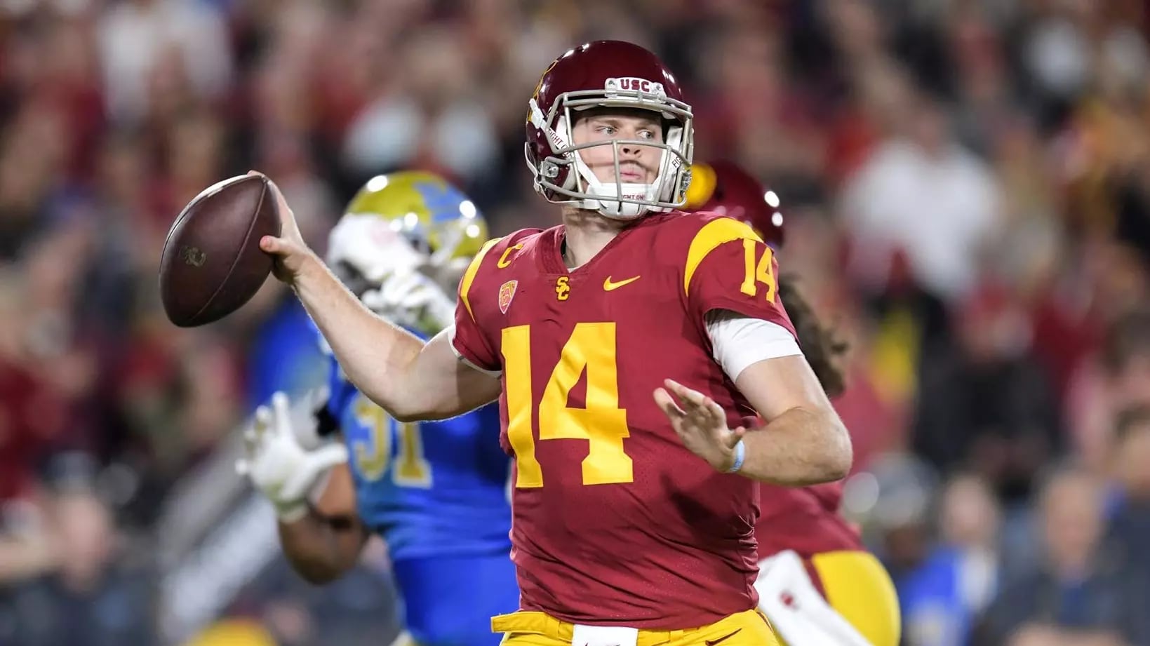 Sam Darnold winds up to make a pass during a game for USC.