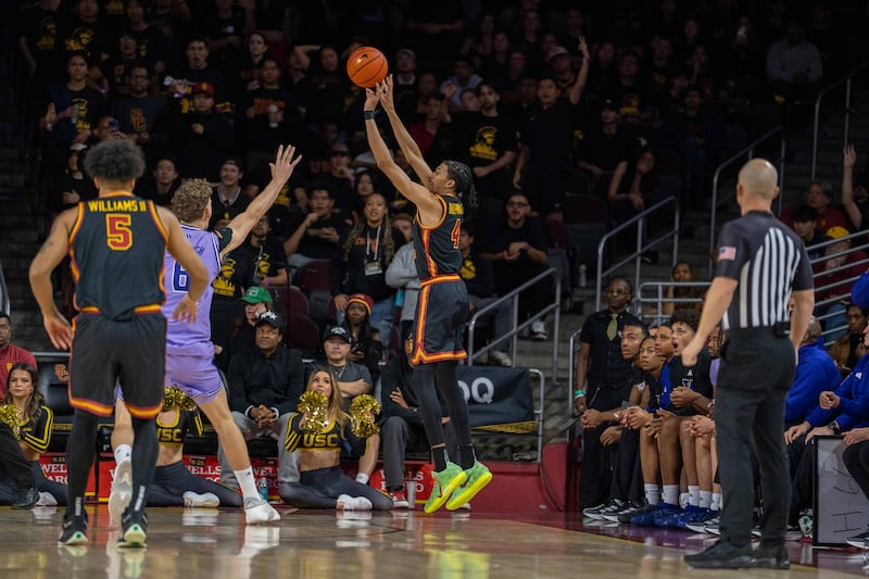 CBM raises up for a 3-pointer against Washington at Galen Center.