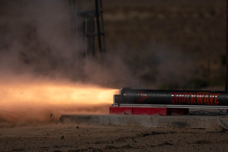 “Shockwave” performs a successful static fire kicking up dirt and debris around the launchpad.