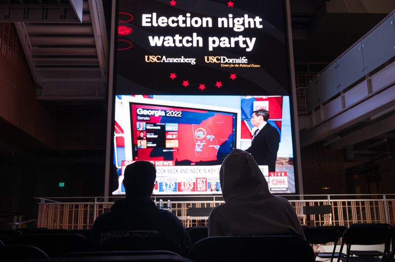 While the USC watch party has ended and the lights of the Wallis Annenberg Hall have turned off, Ash Alguneh and Nolan McDowell-Lesesne, sophomores studying international relations and political science, are still watching the electoral results trickle in. When asked why are they still following the results, they simply replied, "I think our majors speak for themselves." (Photo by Michael Chow)