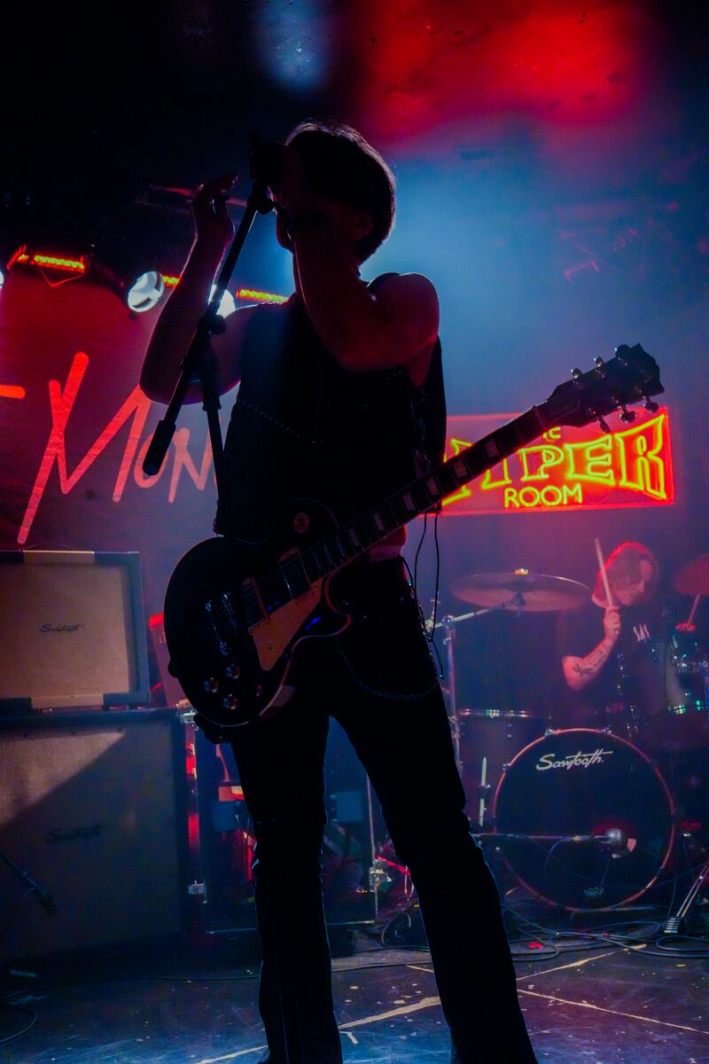 Musician with guitar.