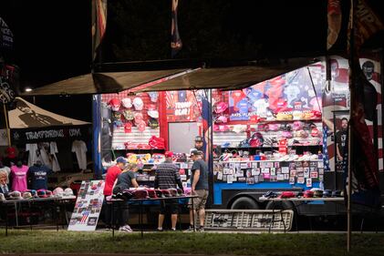 DESCRIBE THE IMAGE FOR ACCESSIBILITY, EXAMPLE: Photo of a chef putting red sauce onto an omelette.