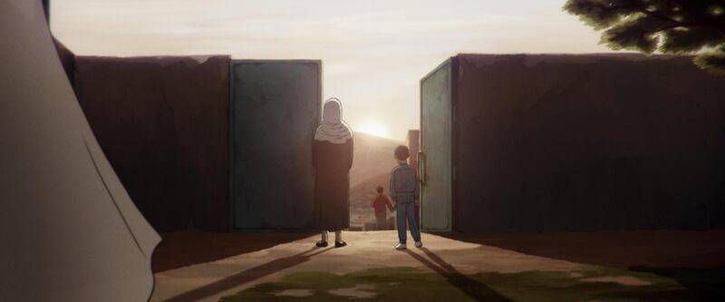 A family standing behind a half-open door, facing the sunset.