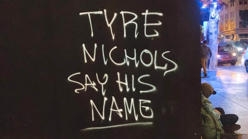 [Photo of graffiti reading "Tyre Nichols Say His Name."]