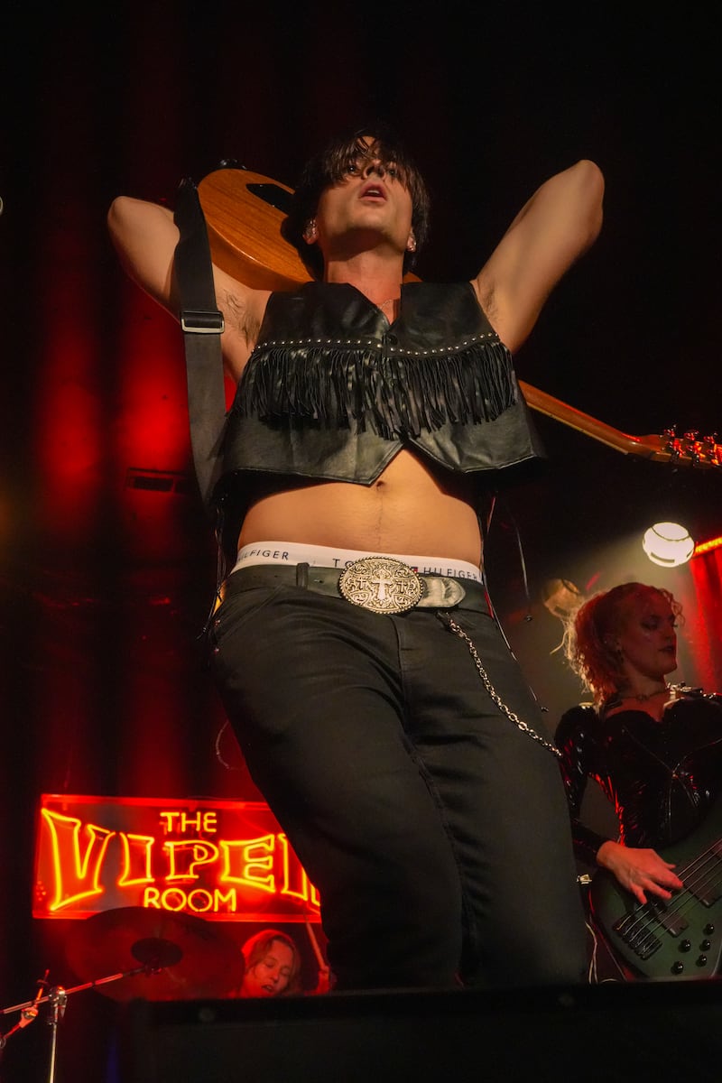 Musician with guitar.