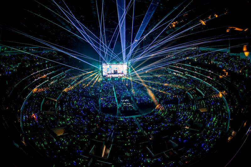 Lights and lasers shining from a stage