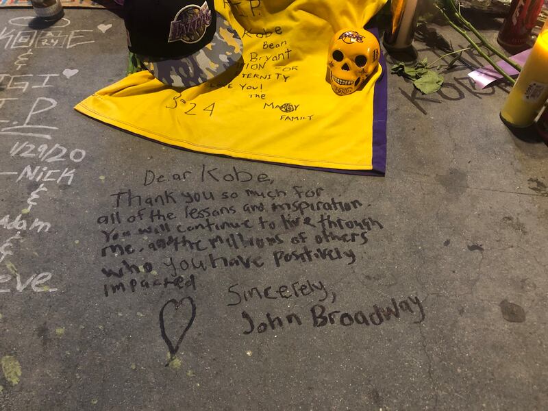 a note by john reads "Dear Kobe, thank you so much for all the lessons and inspiration. you will continue to live through me and millions of others who you have positively impacted. Sincerely, John Broadway."