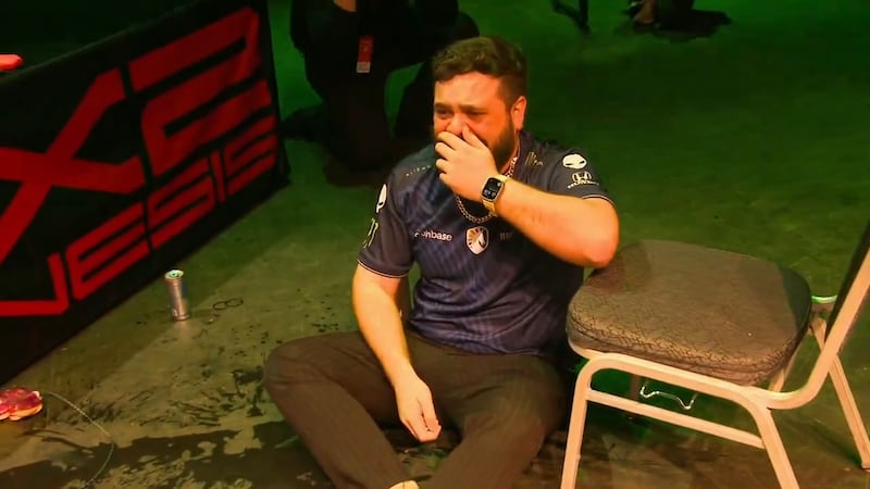 Hungrybox in tears on the floor after his Genesis X2 victory .