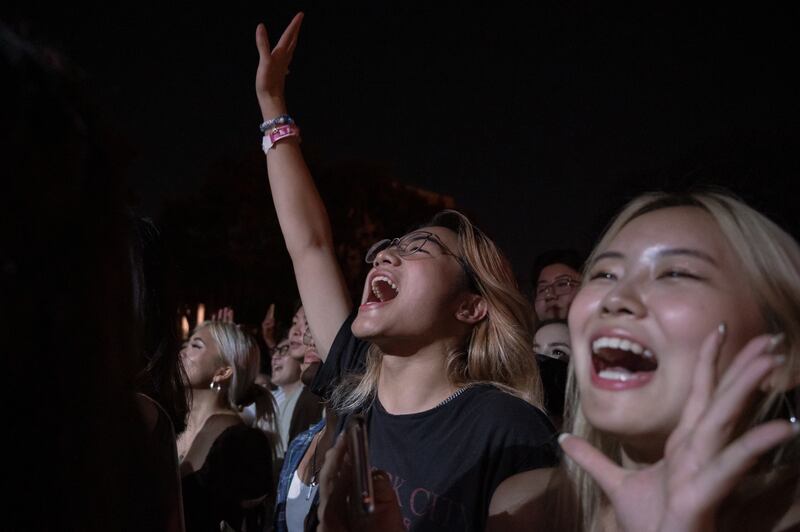 Fans cheer excitedly as Sejeong performs on stage. (Photo by Michael Chow)