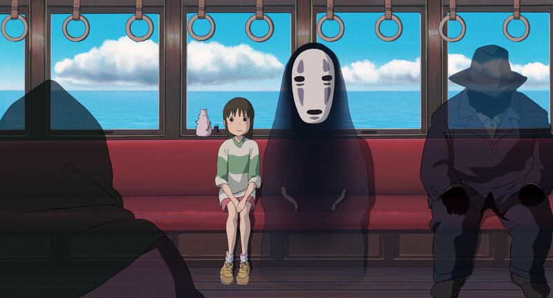 Animated film screenshot of a ghost next to a girl on a train