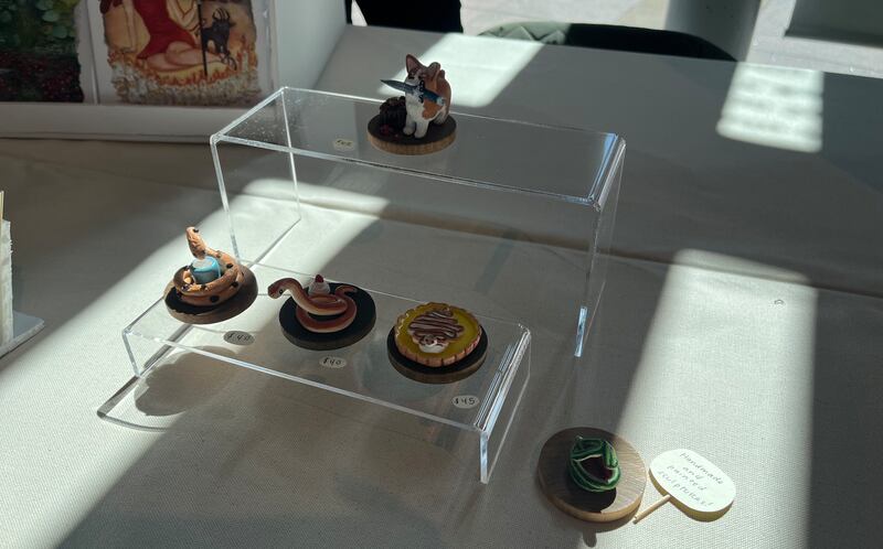 Photo of ceramic snakes coiled up on display