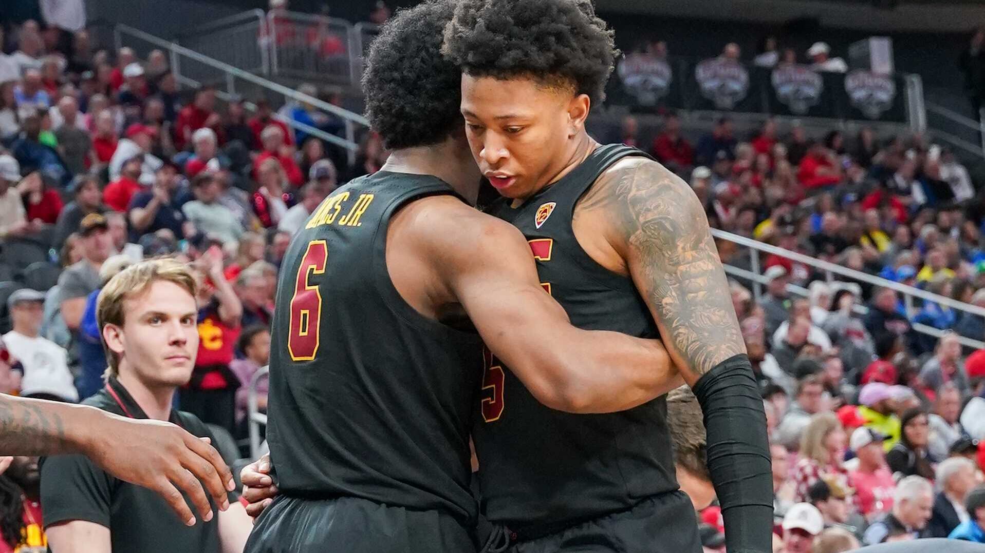 Ellis hugs Bronny James.