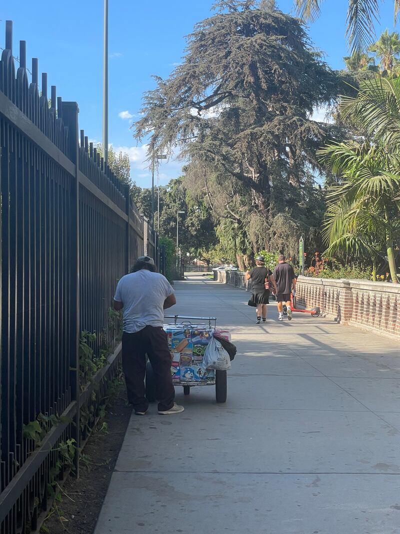 Ruben sets up his ice cream cart in front of Natural History Museum or Los Angeles.