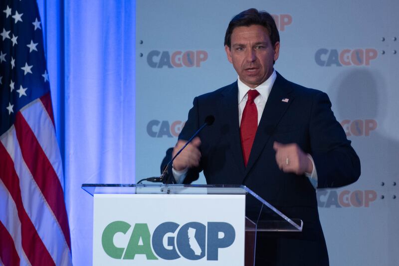 Ron DeSantis giving a speech at the CAGOP event.