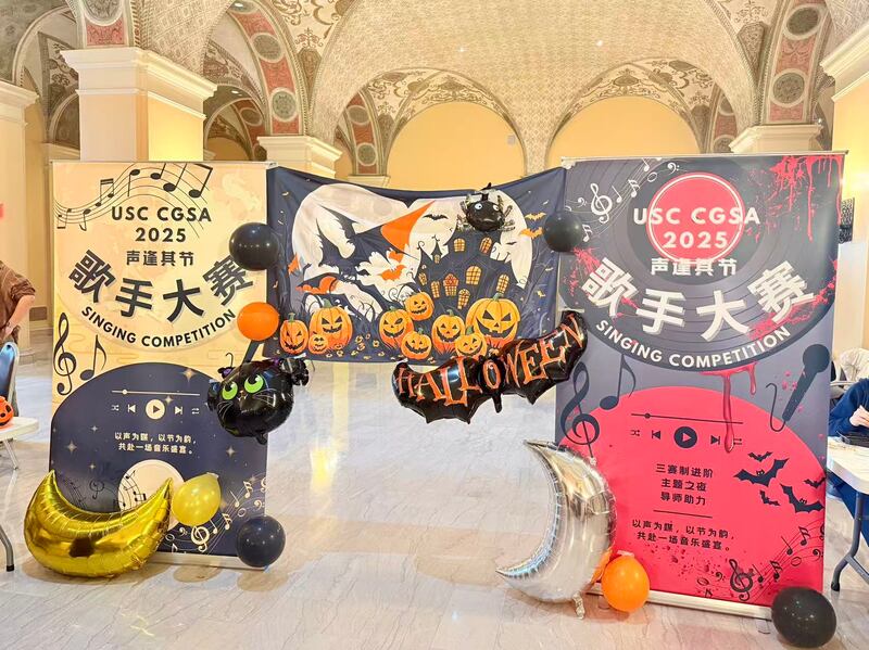 This photo captures the Halloween-themed decoration of the event.