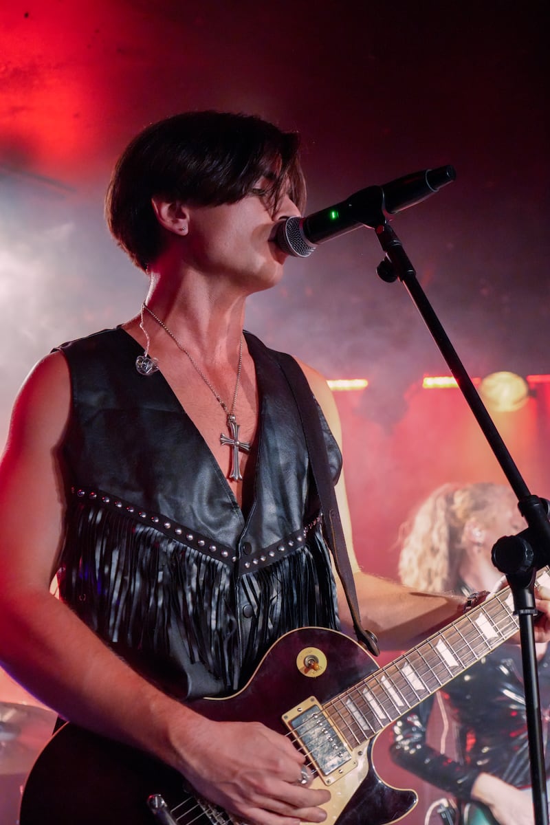 Musician with guitar.