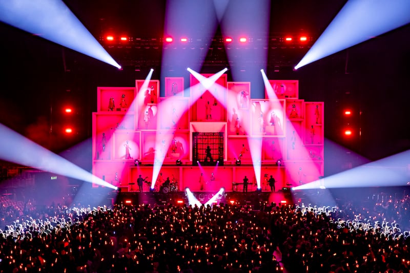 Lights beam from a stage