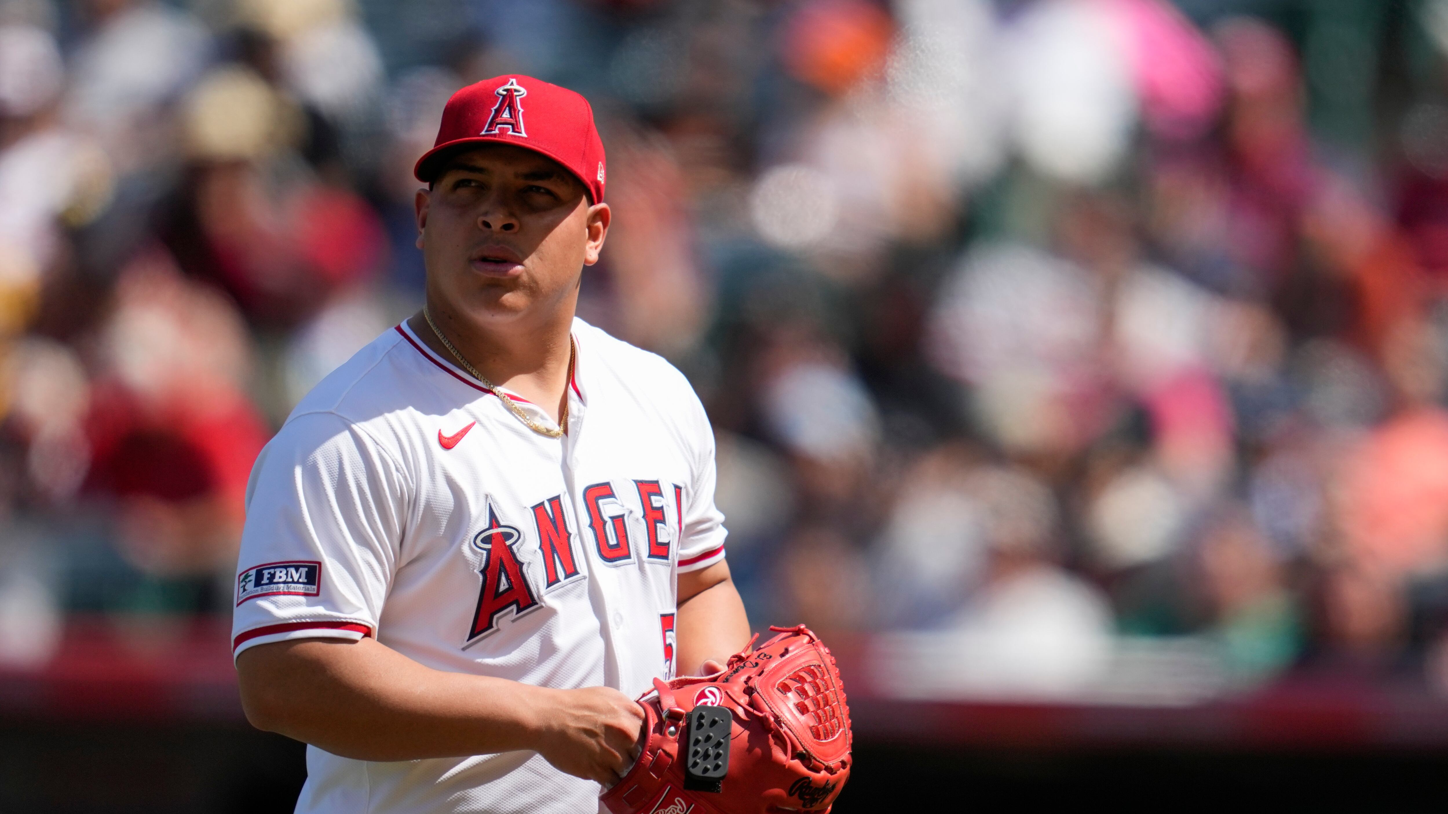 Los Angeles Angels relief pitcher José Suarez, center, is removed from the game by manager Ron Washington during the sixth inning of a baseball game against the Baltimore Orioles in Anaheim, Calif., Wednesday, April 24, 2024. (AP/Ashley Landis)