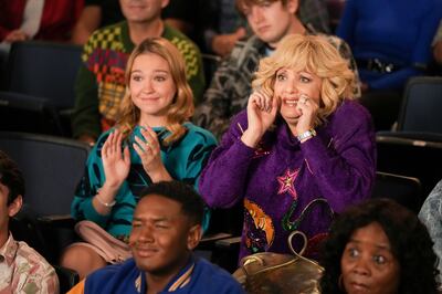 [Bev Goldberg sits in the audience amazed.]