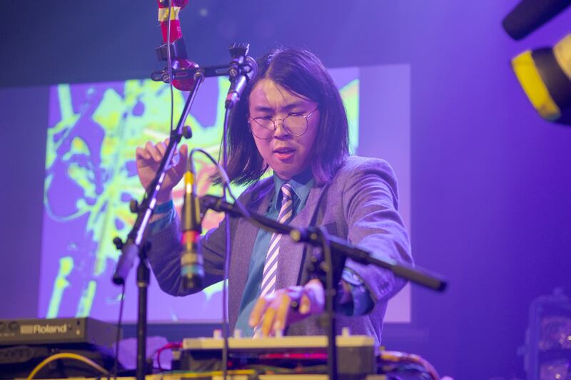 Artist using a synth