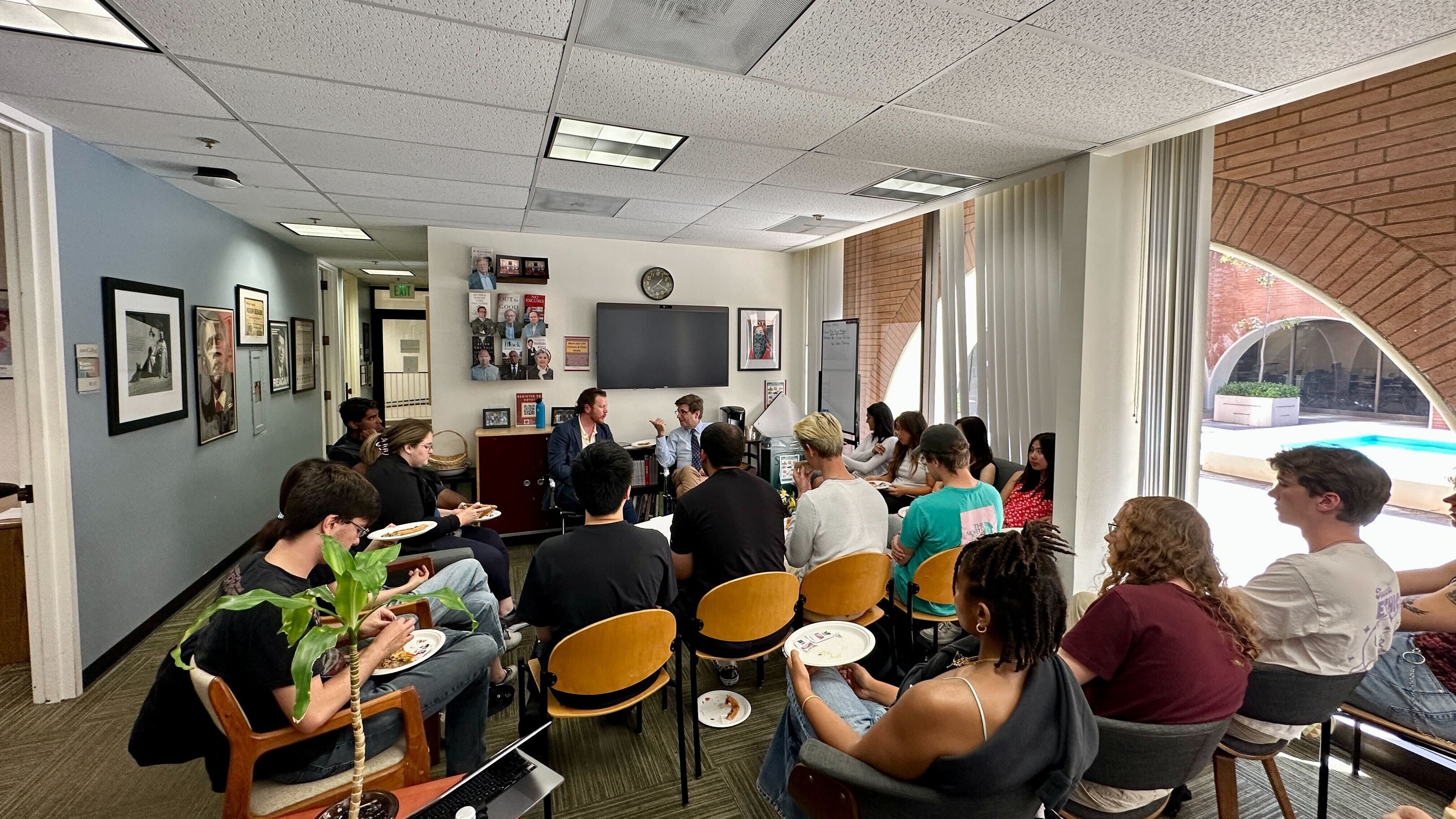DESCRIBE THE IMAGE FOR ACCESSIBILITY, EXAMPLE: Photo of a chef putting red sauce onto an omelette.