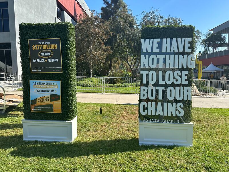 [A photo of Schools Not Prisons art installation at Los Angeles Trade Tech College.]