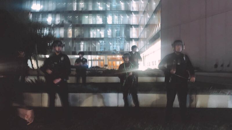 [Photo of LAPD in front of LAPD HQ.]