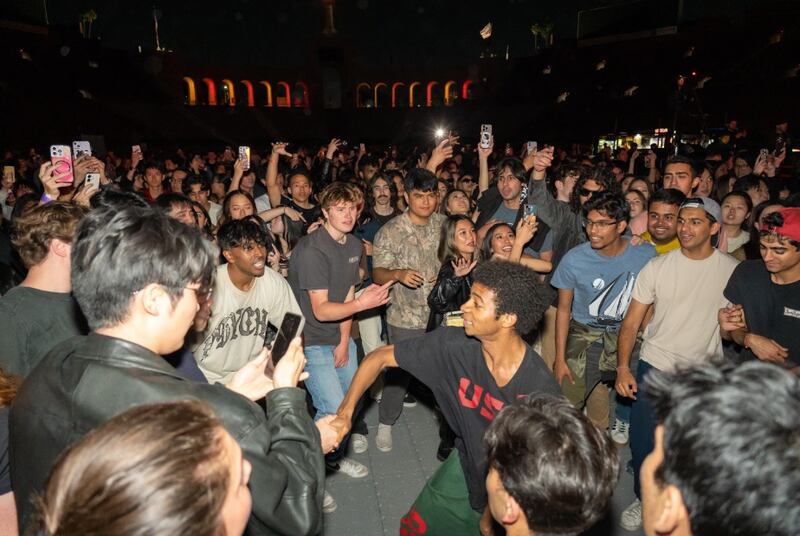 Students gearing up for the chaos, ready to dive into a mosh pit. (Photo by David Lee)