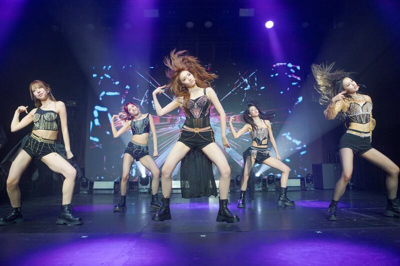 Blue lights and idols on a stage