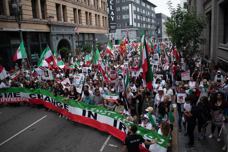 A wide shot of the Mahsa Amini protest marching through downtown L.A.