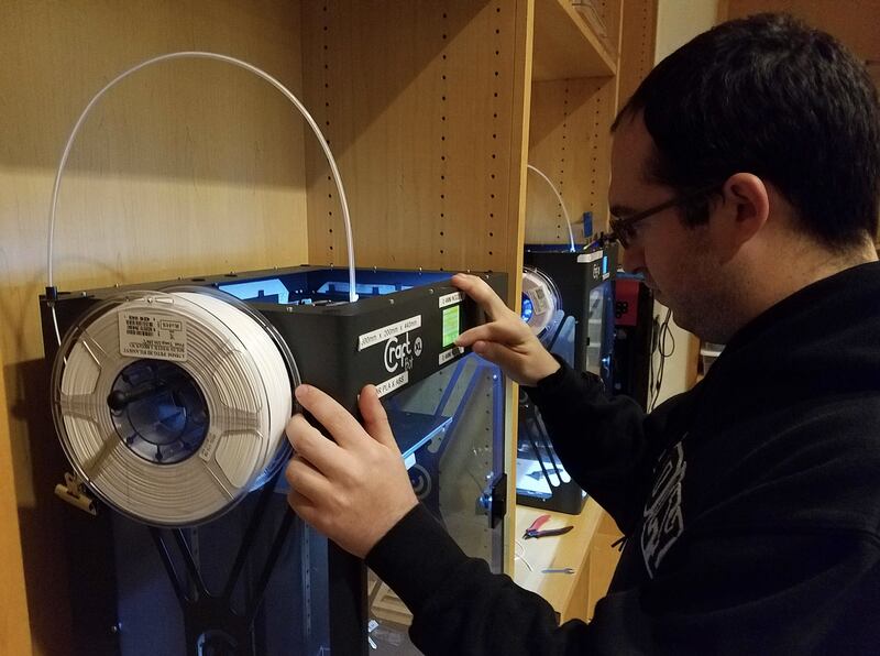 PVNet volunteer prepares a 3D printer [Photo courtesy of PVNet]