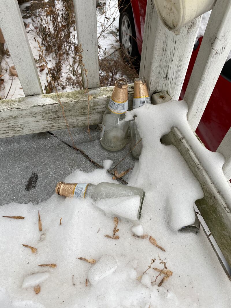 Photo of beer bottles in snow.