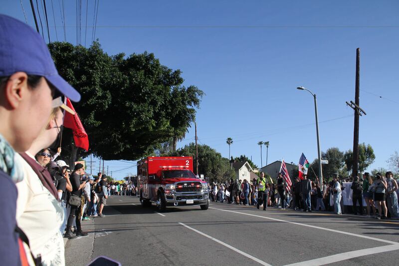 Participants make way for an ambulance in Boyle Heights