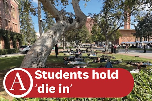 Students hold a silent protest to honor Palestinians