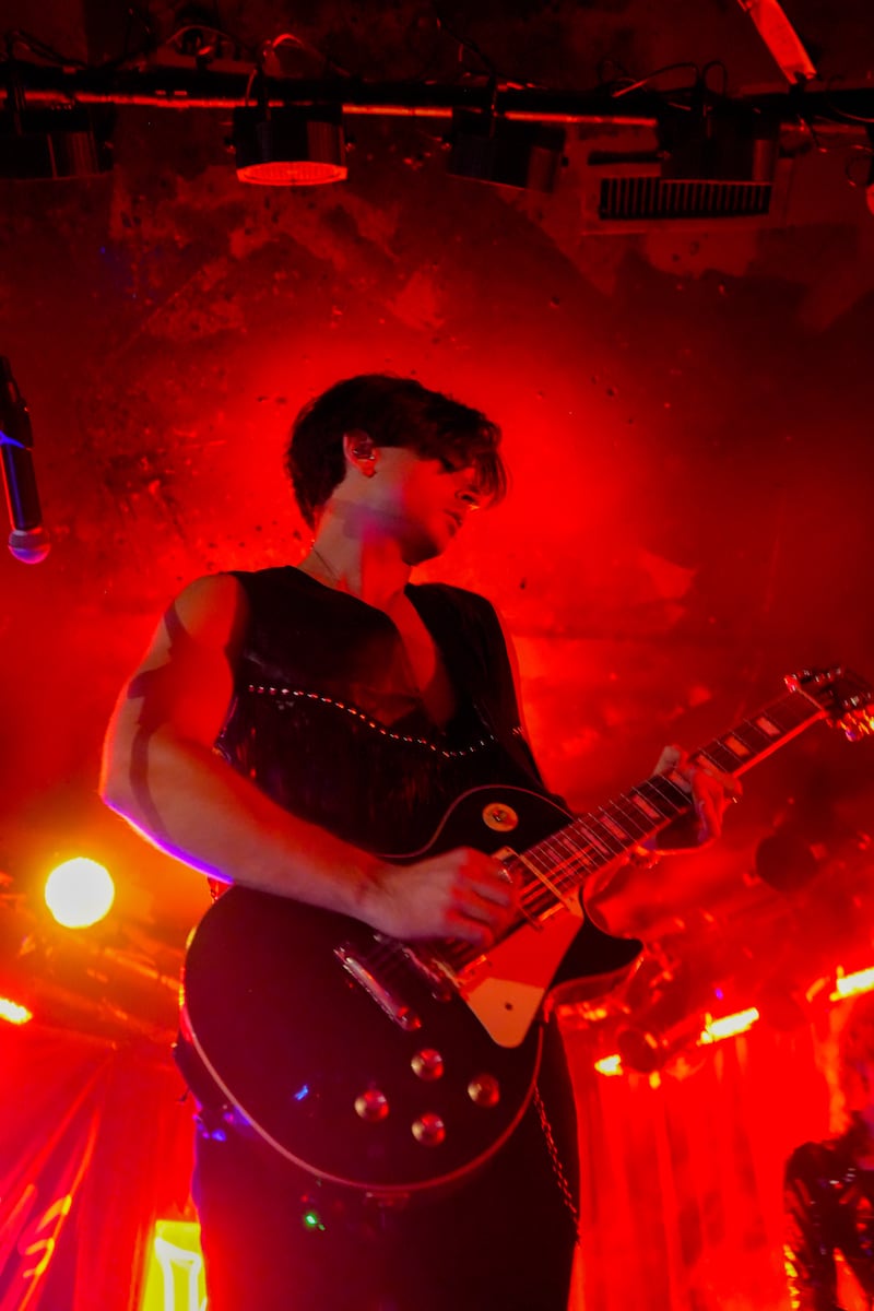 Musician with guitar.